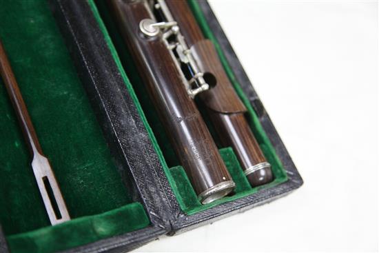 A Rudall Carte & Co. rosewood flute, no. 7340, flute 26.5in.